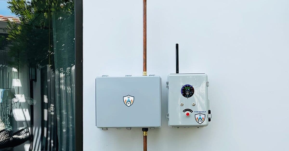 A FireShield controller and manifold installed on a home